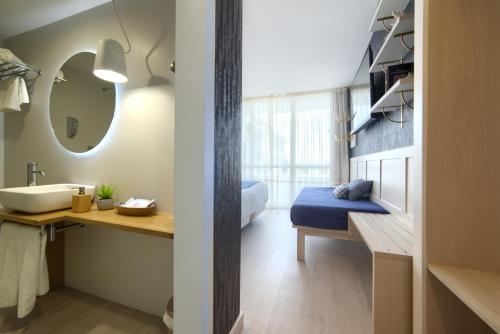 Postel nebo postele na pokoji v ubytování Hotel Luze El Villa
