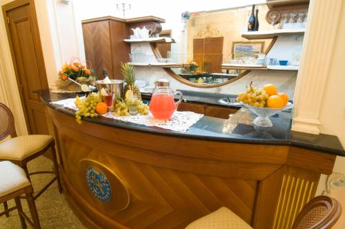 Kuchyňa alebo kuchynka v ubytovaní Hotel Alba