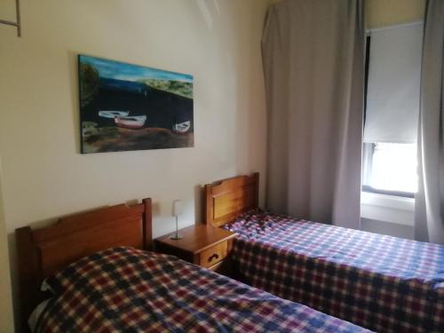 Кровать или кровати в номере Varanda do Minho