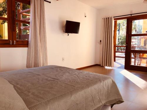 Postel nebo postele na pokoji v ubytování Sina Residencial