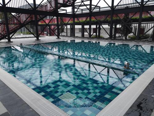 Πισίνα στο ή κοντά στο 7Stonez Suites Geo38 Genting Highlands