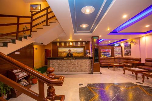 a large room with a lot of tables and chairs at Hotel Crystal Palace in Pokhara
