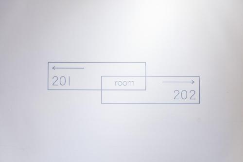 a diagram of a box with a room at Sleep jia in Tainan