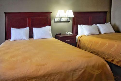 Ένα ή περισσότερα κρεβάτια σε δωμάτιο στο Quality Inn Moore - Oklahoma City