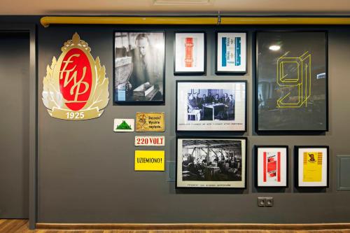 Ein Zertifikat, Auszeichnung, Logo oder anderes Dokument, das in der Unterkunft Arche Hotel Tobaco Łódź ausgestellt ist