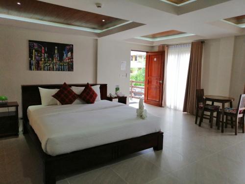 Postel nebo postele na pokoji v ubytování Nirvana Resort Puerto Galera