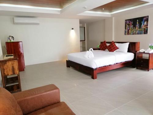 Postel nebo postele na pokoji v ubytování Nirvana Resort Puerto Galera