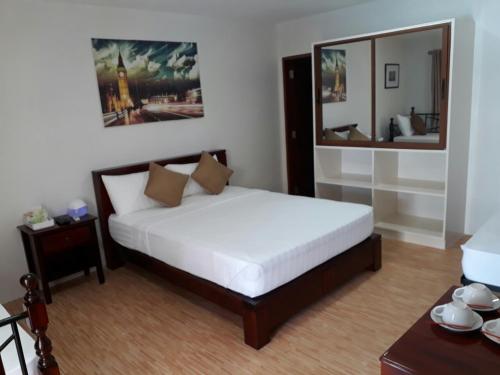 Postel nebo postele na pokoji v ubytování Nirvana Resort Puerto Galera