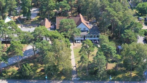 an overhead view of a large house with trees at EFS Höllviksstrand in Höllviken