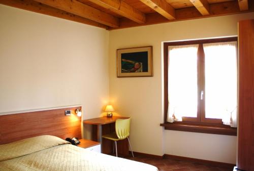 Postel nebo postele na pokoji v ubytování Bed&Wine