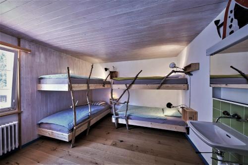 Postel nebo postele na pokoji v ubytování Aktivhostel HängeMatt