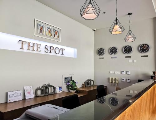 Un certificado, premio, letrero u otro documento en The Spot Residence