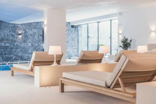 a waiting room with two chairs and a table at Schlosshotel Ischgl 5-Sterne Superior in Ischgl