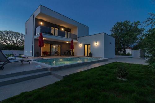 Modern villa Ema near Pula and beach by WiiBuk