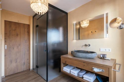 Ett badrum på Hotel VIKTORIAS HOME Kufstein