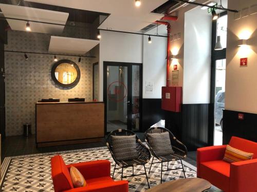 Coin salon dans l'établissement Be Lisbon Hostel Intendente