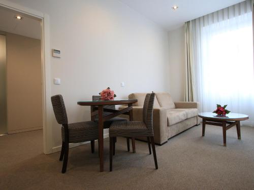 Posezení v ubytování Consolata Hotel