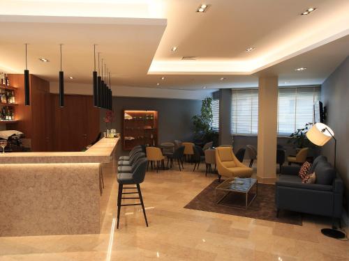 Posezení v ubytování Consolata Hotel