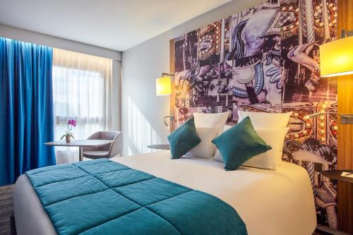 Кровать или кровати в номере Hotel Demeures de Campagne Château de Fontainebleau