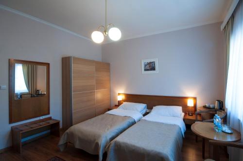 Posteľ alebo postele v izbe v ubytovaní Art Deco Hotel Hoffmann