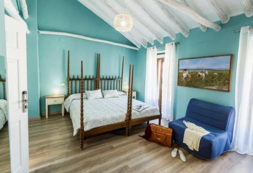 Un pat sau paturi într-o cameră la CASA LOS LAGARES