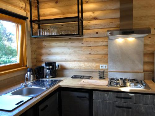 Dapur atau dapur kecil di Boomstamhuis High Chaparral
