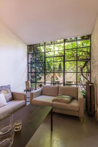 Χώρος καθιστικού στο Maison XIXe et Jardin en Intramuros