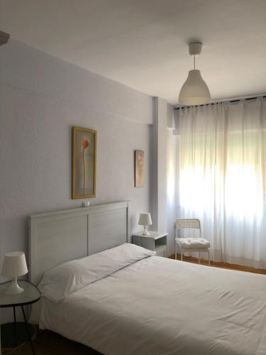 Cama ou camas em um quarto em Apartamento Torrelavega