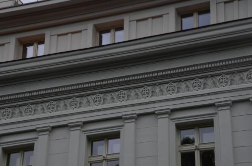 a building with ornate detailing on the side of it at Chevron Hotel in Prague