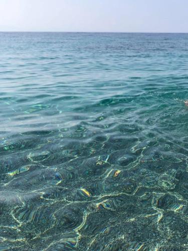 a group of rocks in the water at Persephone in Himare