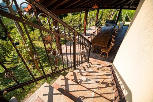 an overhead view of a balcony with a bench at Holiday Home Kerin in Cerklje ob Krki