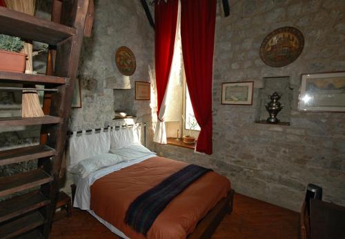 Posteľ alebo postele v izbe v ubytovaní La Martellina B&B