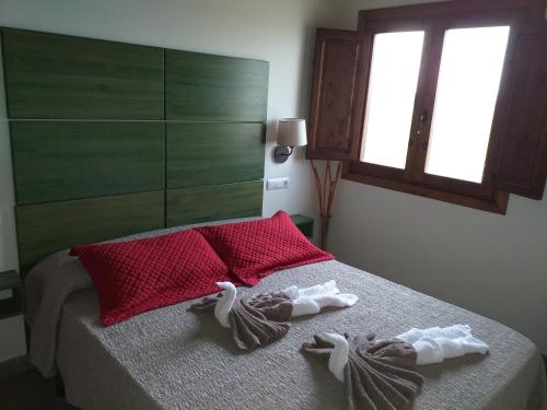 Postel nebo postele na pokoji v ubytování Mas dels Bonos