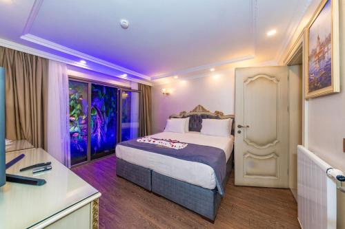 Katil atau katil-katil dalam bilik di Almadina Hotel Istanbul