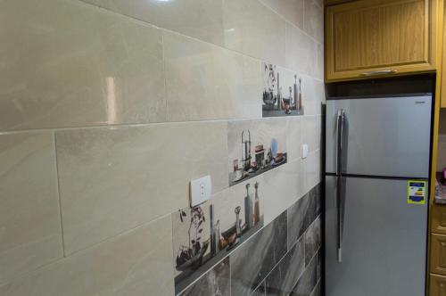 Una cocina o cocineta en City Stars Apt2