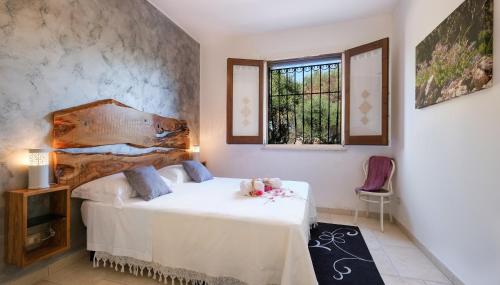 En eller flere senge i et værelse på Tenuta la Trebbia