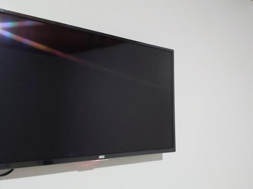 TV a/nebo společenská místnost v ubytování Hotel Monte Carlo