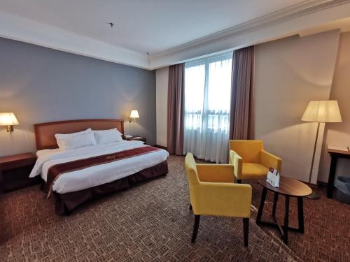 Postel nebo postele na pokoji v ubytování Classic Hotel