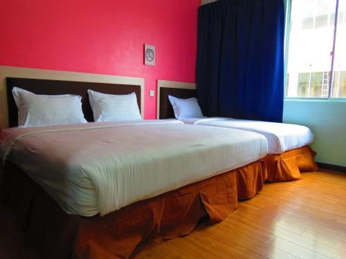 Posteľ alebo postele v izbe v ubytovaní Salim Inn