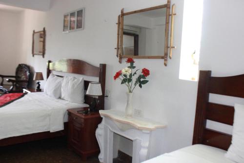 Postel nebo postele na pokoji v ubytování Maison Vu Tri Vien