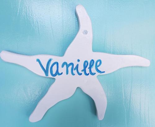 a starfish with the word romantic written on it at Hotel & Apartments "CHEZ HIVA" in Hanga Roa