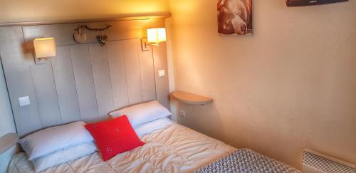 Кровать или кровати в номере Appartement La Plagne Soleil