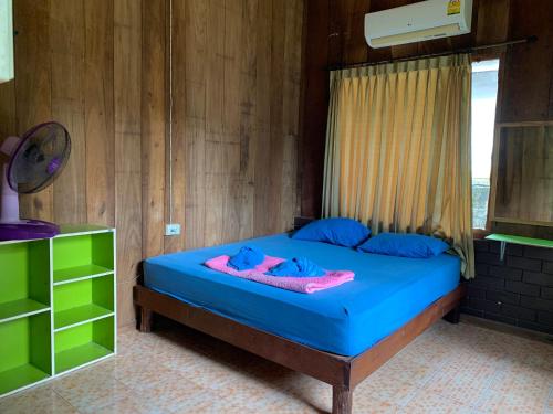 Postel nebo postele na pokoji v ubytování PD Guesthouse