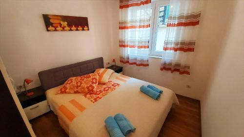 Postel nebo postele na pokoji v ubytování Apartment Mario