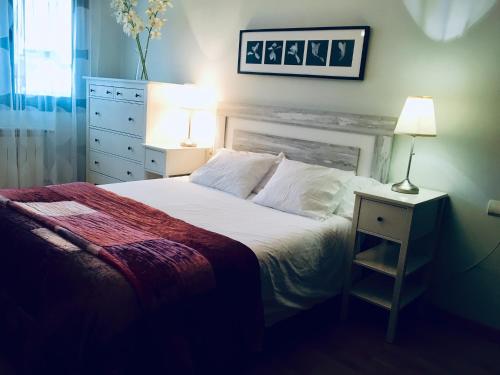 Postel nebo postele na pokoji v ubytování Apartamentos Confortarte