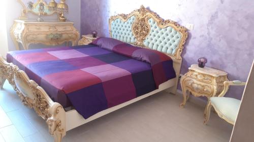 Кровать или кровати в номере Allegra's house Cipro