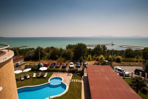 an aerial view of a resort with a swimming pool at Семеен хотел"Свети Георги" in Burgas City