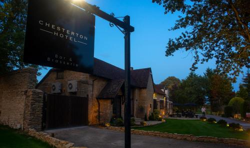a street sign in front of a building at The Chesterton Hotel in Bicester
