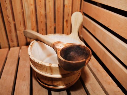 a wooden bowl with a wooden spoon in it at City Backpackers Hostel in Stockholm