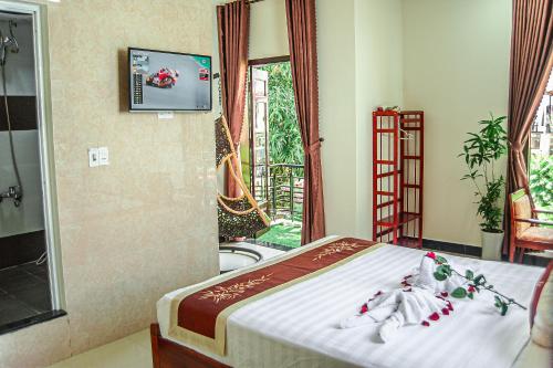 Giường trong phòng chung tại Golden Soulmate homestay